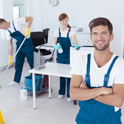 Image of young man working for cleaning company
